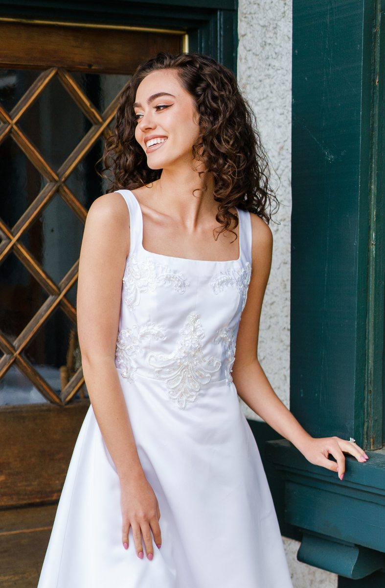 White fashion bride rehearsal dress